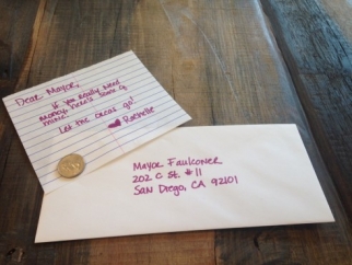 An envelope with a note addresses to Mayor Faulconer