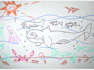A drawing of a whale in the ocean.