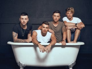 Union J poses in a bathtub to boycott seaworld.