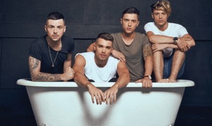 Union J poses in a bathtub to boycott seaworld.