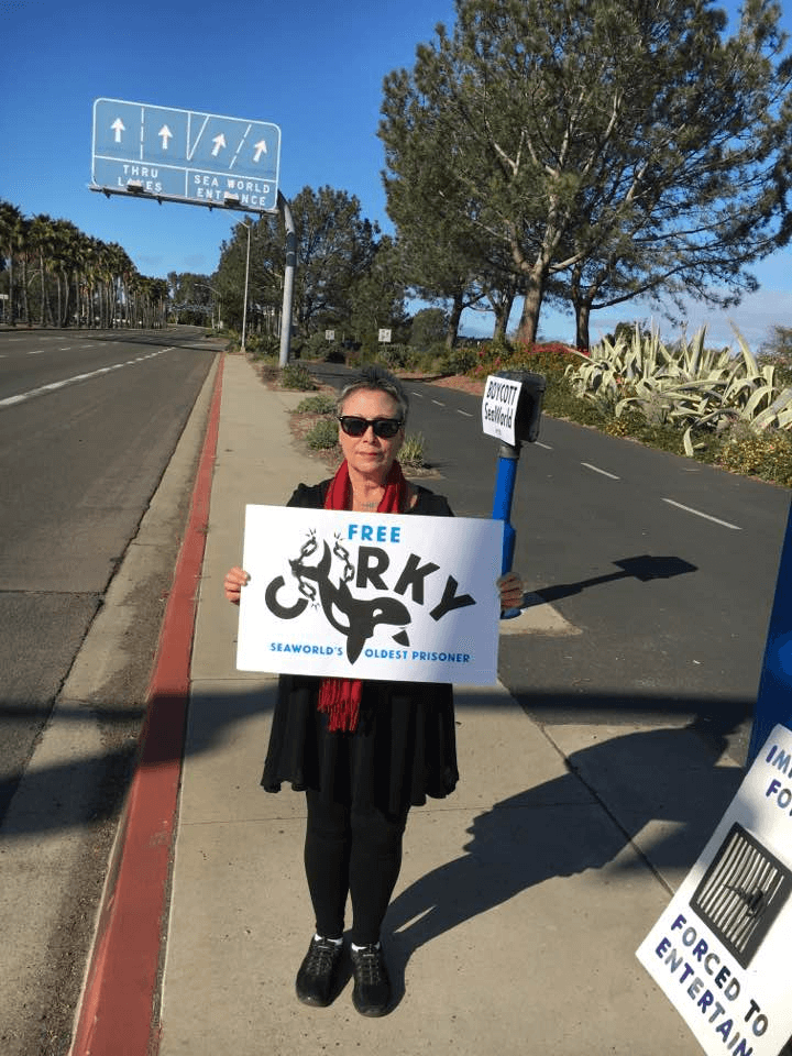 Woman at 47th year anniversary demo