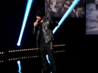 Nick Cannon performing on stage