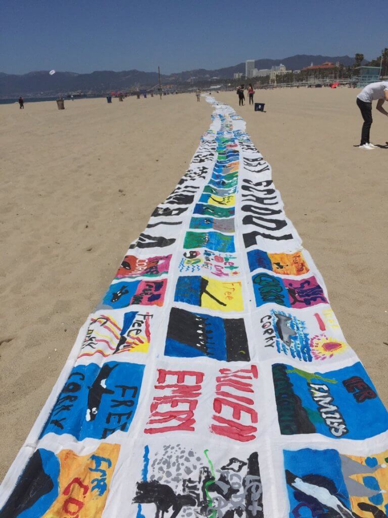 A long piece of fabric on the Seaworld beach.