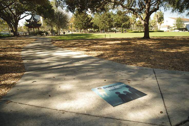 'SeaWorld: Where Timeouts Never End" sidewalk decal at Orlando playground